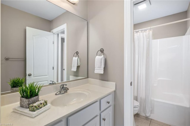 full bath with shower / bath combination with curtain, vanity, toilet, and tile patterned floors