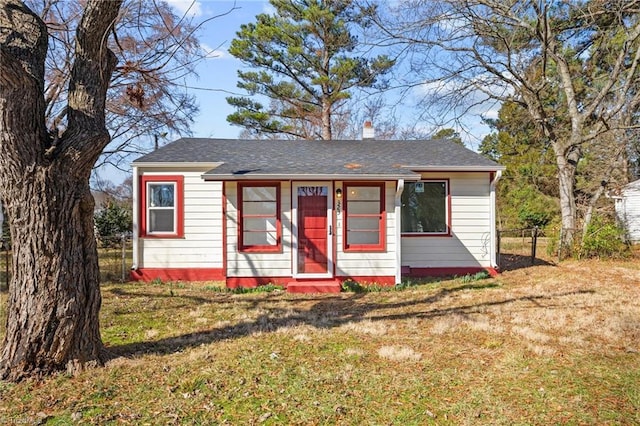 view of front of home with a front lawn