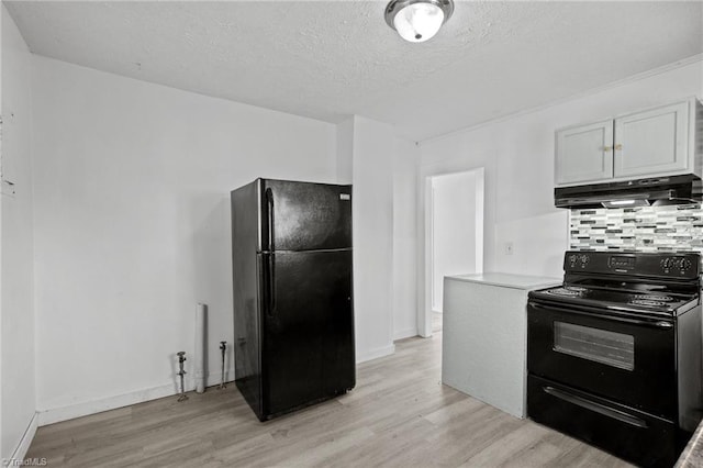 kitchen featuring light hardwood / wood-style flooring, backsplash, a textured ceiling, black appliances, and white cabinets