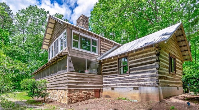 140 Blue Heron Ln, Wilkesboro, NC 28697 - rear view of property featuring a chimney and a sunroom