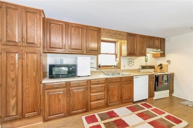 140 Blue Heron Ln, Wilkesboro, NC 28697 - kitchen featuring range with electric stovetop, black microwave, white dishwasher, a sink, and under cabinet range hood