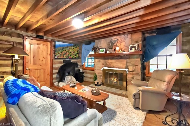 140 Blue Heron Ln, Wilkesboro, NC 28697 - living area featuring a fireplace, wood finished floors, healthy amount of natural light, and beamed ceiling