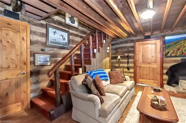 140 Blue Heron Ln, Wilkesboro, NC 28697 - living room featuring stairs, wood walls, and wood finished floors