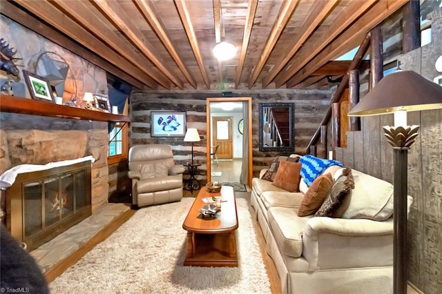 140 Blue Heron Ln, Wilkesboro, NC 28697 - living area featuring a fireplace, wood walls, and stairs
