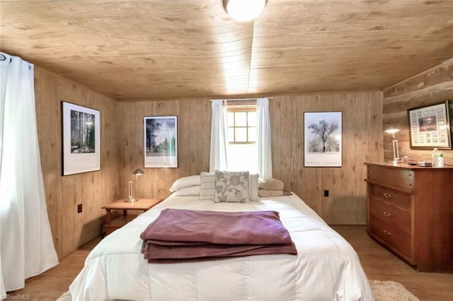 140 Blue Heron Ln, Wilkesboro, NC 28697 - bedroom featuring wooden ceiling, light wood-type flooring, and wooden walls