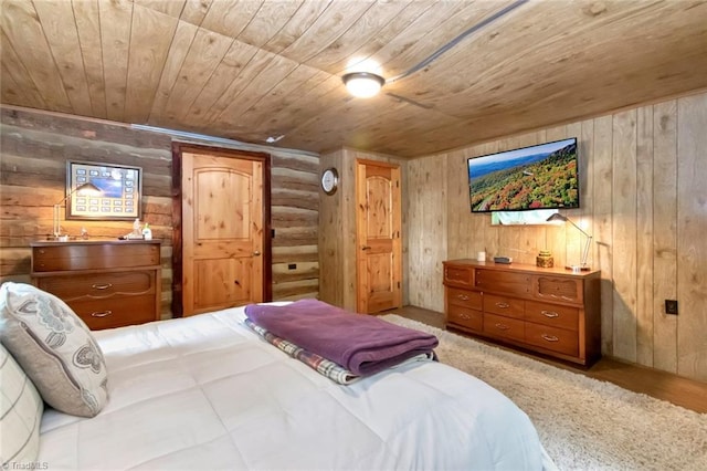 140 Blue Heron Ln, Wilkesboro, NC 28697 - bedroom featuring wooden ceiling, log walls, and wooden walls