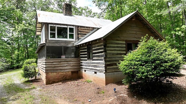 140 Blue Heron Ln, Wilkesboro, NC 28697 - view of front of home with crawl space, a chimney, log exterior, and metal roof