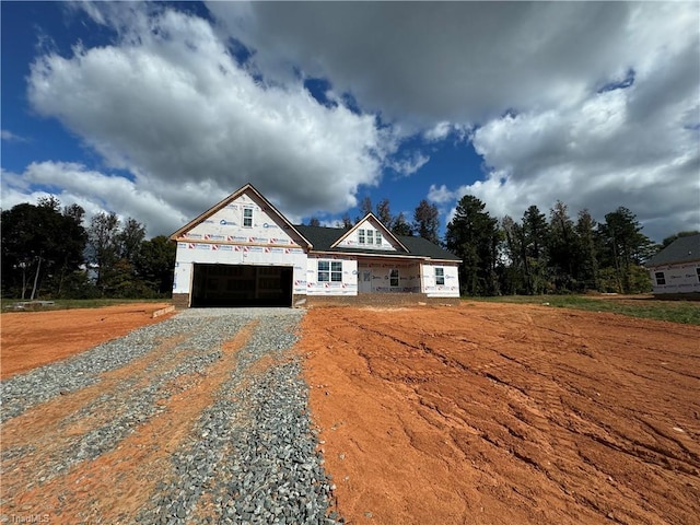 property under construction with a garage