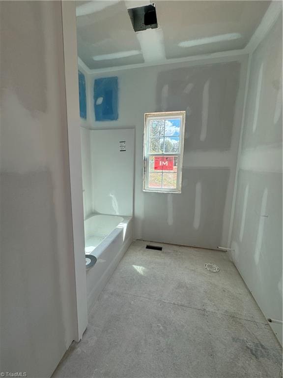 bathroom with a washtub