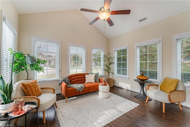 sunroom / solarium featuring ceiling fan and lofted ceiling