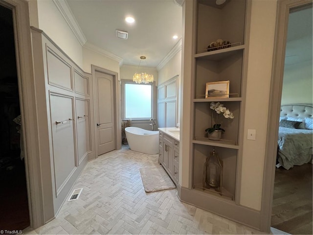 6792 Meadow View Dr, Summerfield, NC 27358 - full bathroom with crown molding, a freestanding tub, vanity, a chandelier, and connected bathroom