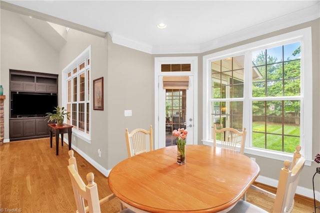 6122 Olde Fields Way, Pfafftown, NC 27040 - dining area with plenty of natural light, light wood-style floors, baseboards, crown molding, and recessed lighting