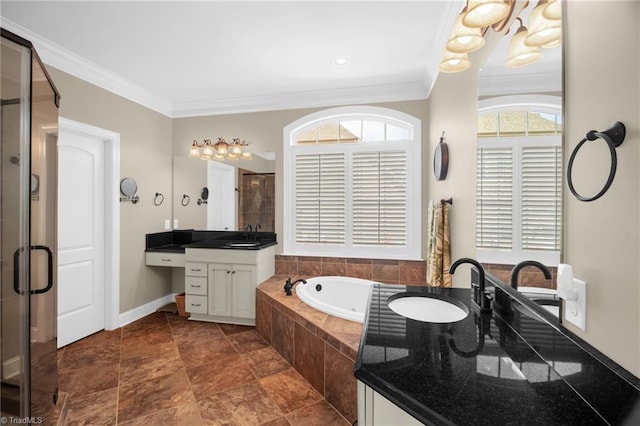 6122 Olde Fields Way, Pfafftown, NC 27040 - full bathroom featuring a stall shower, crown molding, a bath, vanity, and baseboards