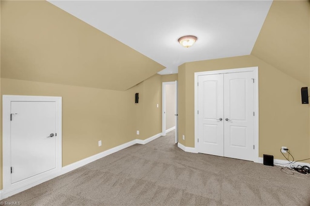 6122 Olde Fields Way, Pfafftown, NC 27040 - additional living space featuring carpet flooring, vaulted ceiling, and baseboards