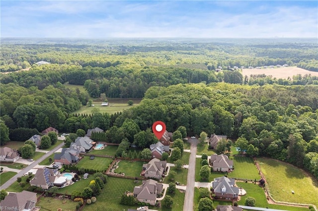 6122 Olde Fields Way, Pfafftown, NC 27040 - aerial view of residential area featuring a heavily wooded area