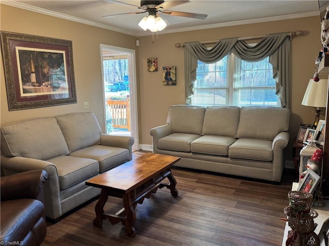 living room with ceiling fan, a wealth of natural light, and ornamental molding