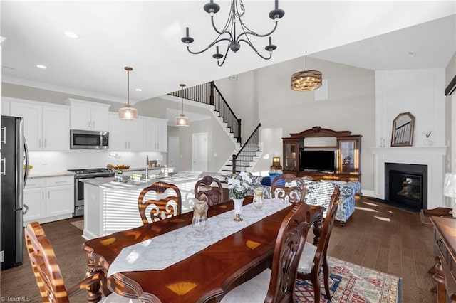 dining room featuring dark hardwood / wood-style flooring and a chandelier