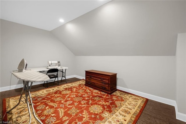 office space with lofted ceiling and wood-type flooring