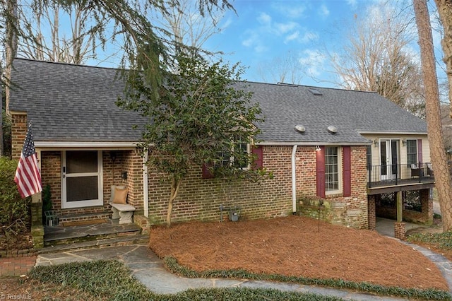 view of front of property with a wooden deck