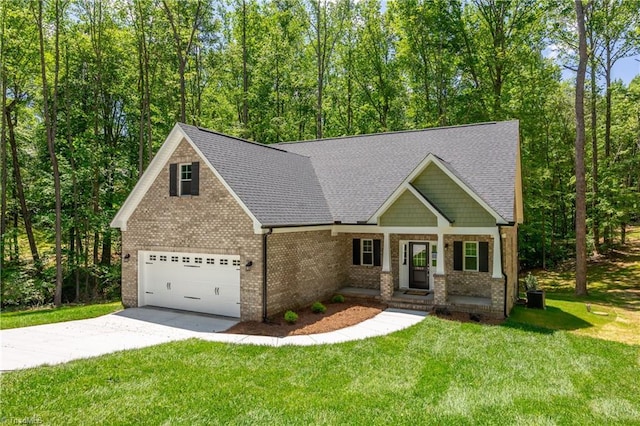 craftsman inspired home with concrete driveway, brick siding, a front lawn, and roof with shingles