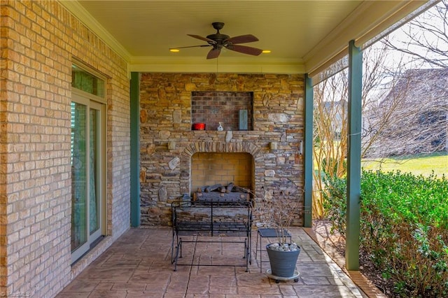 view of patio / terrace featuring an outdoor stone fireplace