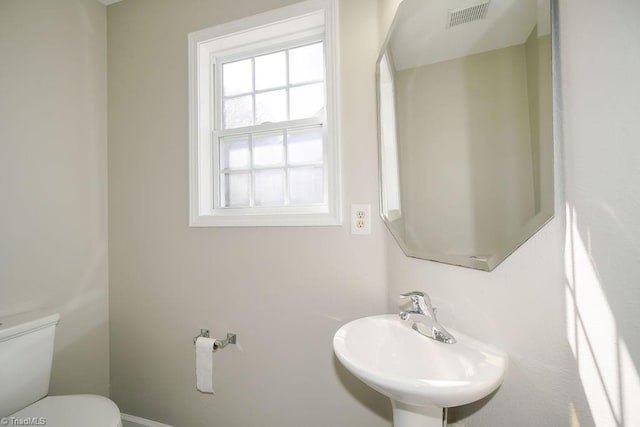 bathroom with sink and toilet