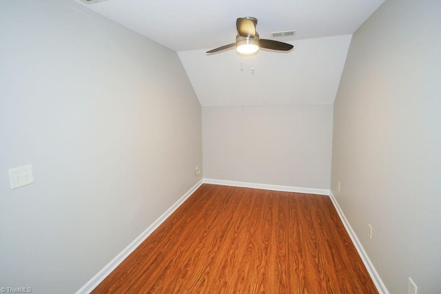 additional living space with hardwood / wood-style flooring, ceiling fan, and lofted ceiling