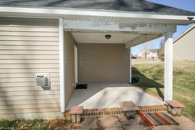 view of patio featuring a carport