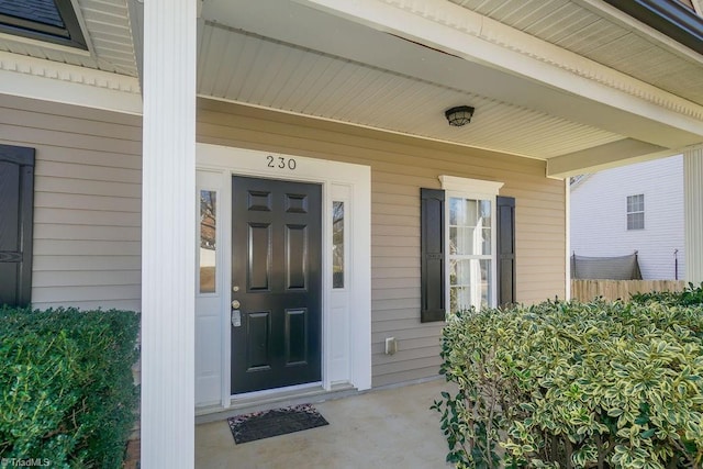 entrance to property with covered porch