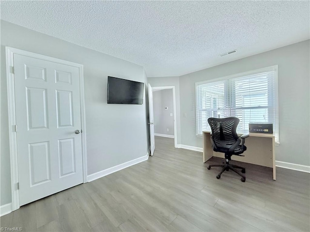 12 Cedar Knoll Ct Unit 12, Greensboro, NC 27407 - office space with wood finished floors and a textured ceiling