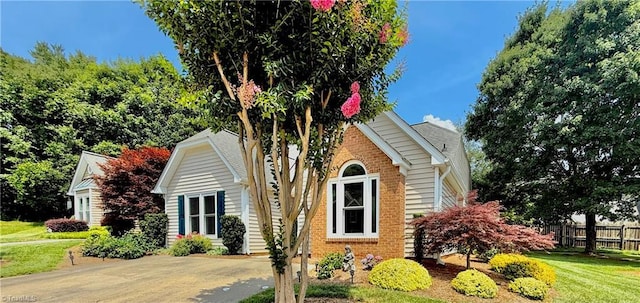12 Cedar Knoll Ct Unit 12, Greensboro, NC 27407 - view of property hidden behind natural elements with brick siding