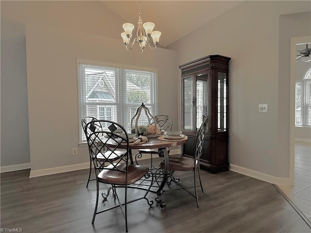 12 Cedar Knoll Ct Unit 12, Greensboro, NC 27407 - dining room featuring vaulted ceiling, healthy amount of natural light, wood finished floors, and a chandelier