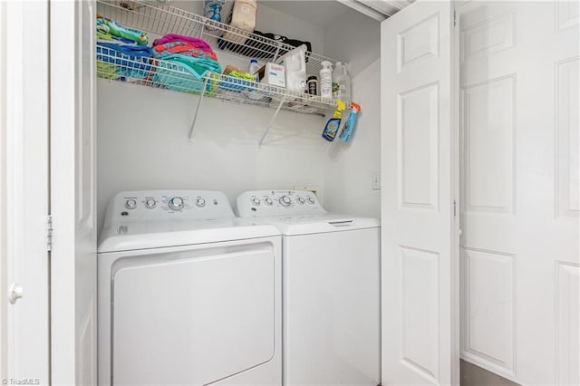 laundry room featuring laundry area and washer and clothes dryer