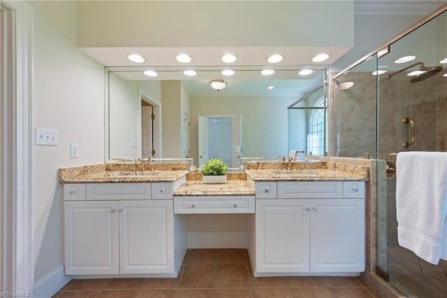 bathroom with vanity, tile patterned floors, and a stall shower