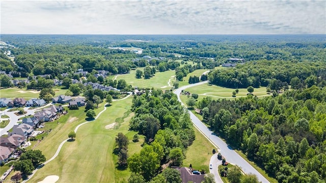 bird's eye view with a residential view, a forest view, and golf course view