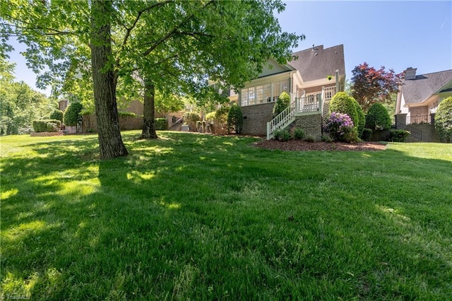 view of yard with stairway
