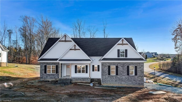 406 Wild Fern Ln, Reidsville, NC 27320 - view of front of property featuring a porch and brick siding