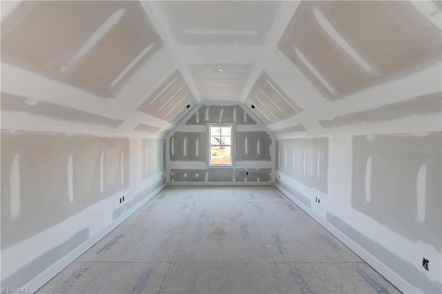 bonus room featuring lofted ceiling