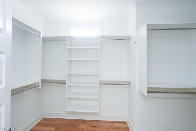 3799 Peony Way, Clemmons, NC 27012 - spacious closet featuring wood finished floors