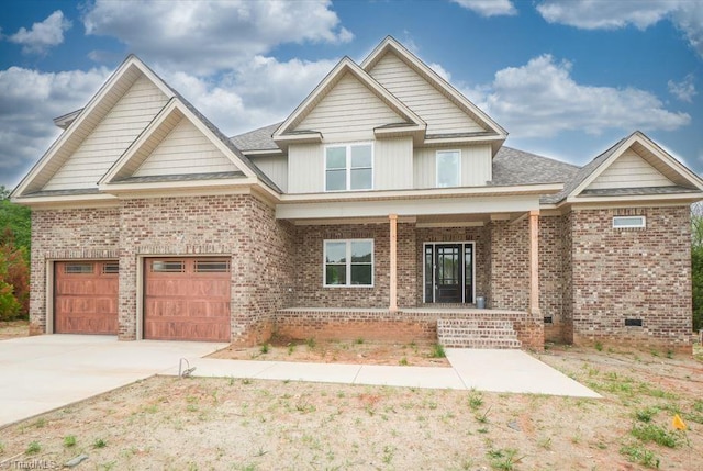 3799 Peony Way, Clemmons, NC 27012 - craftsman house featuring concrete driveway, roof with shingles, crawl space, a porch, and brick siding