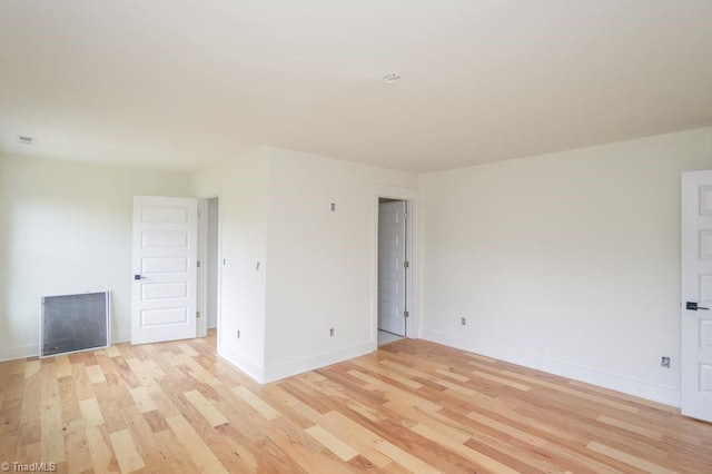 3799 Peony Way, Clemmons, NC 27012 - spare room featuring light wood-style flooring and baseboards