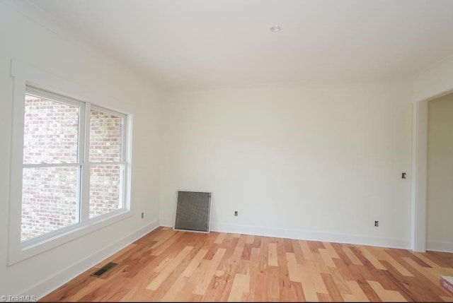 3799 Peony Way, Clemmons, NC 27012 - spare room featuring light wood finished floors, visible vents, a wealth of natural light, and baseboards