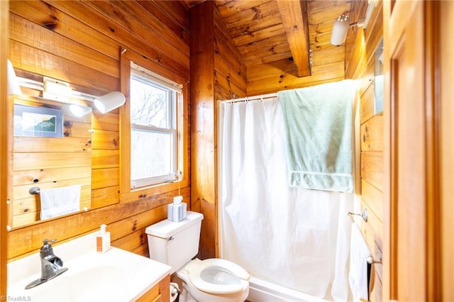 bathroom with a shower with shower curtain, toilet, wood ceiling, vanity, and wood walls