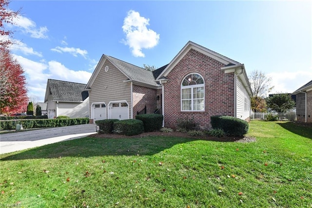 ranch-style house with an attached garage, driveway, brick siding, and a front yard