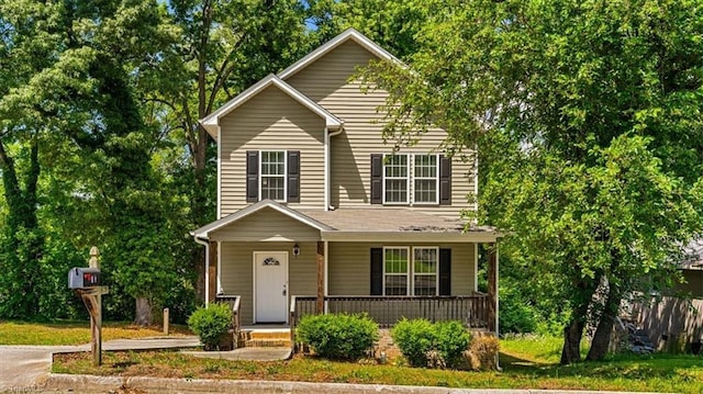 810 Mobile St, High Point, NC 27262 - traditional-style house with a porch