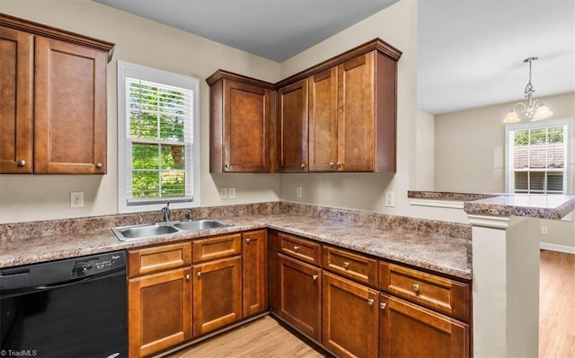 810 Mobile St, High Point, NC 27262 - kitchen featuring black dishwasher, a sink, light wood-type flooring, and healthy amount of natural light