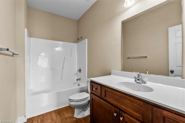 810 Mobile St, High Point, NC 27262 - full bathroom featuring wood finished floors, toilet, shower / washtub combination, and vanity