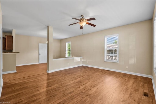 810 Mobile St, High Point, NC 27262 - empty room featuring ceiling fan, wood finished floors, and baseboards