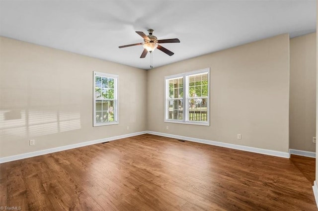 810 Mobile St, High Point, NC 27262 - spare room with ceiling fan, wood finished floors, and baseboards