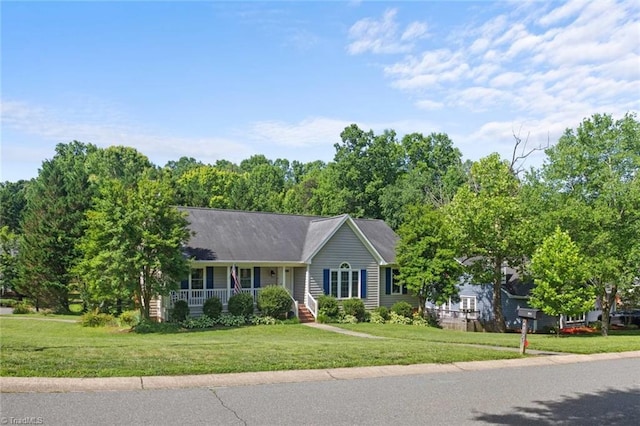 4012 Clarendon Ave, Winston-Salem, NC 27106 - ranch-style house with covered porch and a front yard